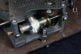 As Speed Increase, Flyweights Pull Brass Brake Disk to Left