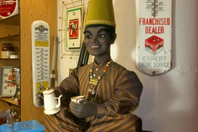 Issasse Advertising Automaton. Liquid Pours Into the Cup and Recirculates Through a Tube in the Arms.