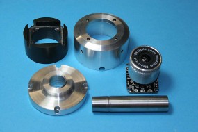 CW From Top Left: Acetal Base, Canister, Image Module, Spindle Shaft, Cover